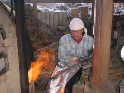 Matsuzaki Feeding the Fire